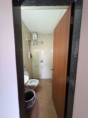 Bathroom in 1 BHK Apartment at Raunak Bliss, Ghodbunder Road – for Rent
