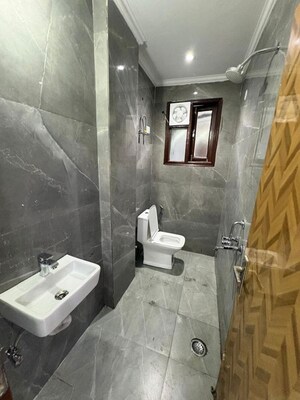 Bathroom in 1 BHK Apartment at Freedom Fighters Vihar – for Rent