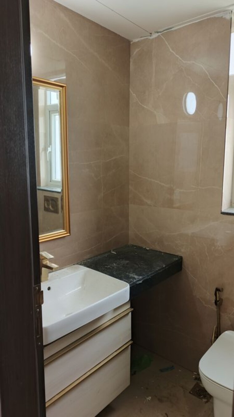 Bathroom, smart-world-orchard 3 Bedroom 1680 Sq.Ft. Apartment In Sector 61 Gurgaon 10693121
