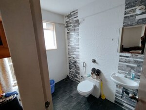 Bathroom in 3 BHK Apartment at ARC Pukhraj, Mundhwa – for Rent