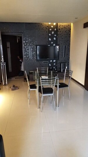 Living Room in 4 BHK Apartment at Indradarshan II, Oshiwara – for Sale