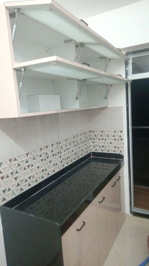 Kitchen in 2 BHK Apartment at Siddhi Highland Haven, Balkum Pada – for Rent