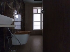 Kitchen in 3 BHK Apartment at Dosti West County, Balkum Pada – for Rent