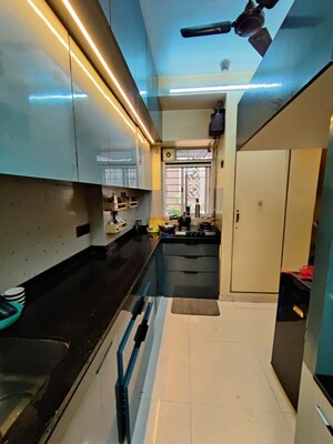 Kitchen in 3 BHK Apartment at Dosti West County, Balkum Pada – for Rent