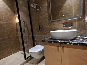 Bathroom in 4 BHK Apartment at Vasant Kunj – for Sale