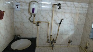 Bathroom in 1 BHK Apartment at Shri Kumar Society, Santacruz East – for Rent