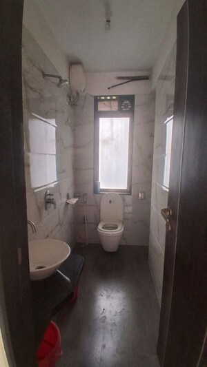 Bathroom in 2 BHK Apartment at Wisemen Fressia Rainbello, Malad East – for Rent