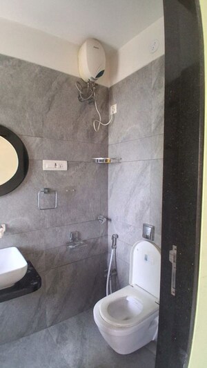 Bathroom in 2 BHK Apartment at Wisemen Fressia Rainbello, Malad East – for Rent