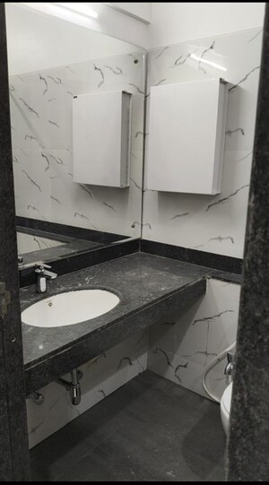 Bathroom in 3 BHK Apartment at Lakshachandi Heights, Goregaon East – for Rent