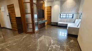 Living Room in 4 BHK Apartment at Charisma Apartment, Bandra West – for Rent