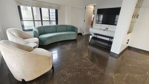 Living Room in 4 BHK Apartment at Charisma Apartment, Bandra West – for Rent