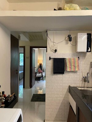 Living Room in 1 BHK Apartment at Juhu – for Rent