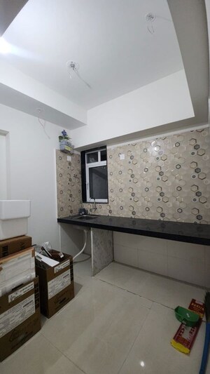 Kitchen in 1 BHK Apartment at Atmiya Centria, Santacruz East – for Sale