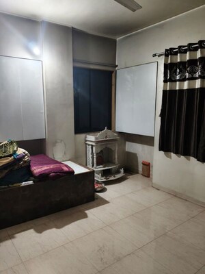Bedroom in 2 BHK Apartment at Nisarg Akruti, Pimple Nilakh – for Rent