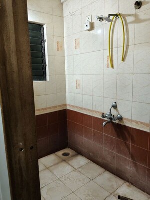 Bathroom in 2 BHK Apartment at Nisarg Akruti, Pimple Nilakh – for Rent