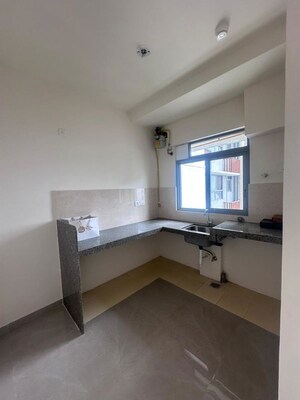 Kitchen in 2 BHK Apartment at Piramal Vaikunth, Balkum Pada – for Rent