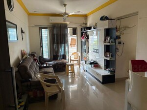 Living Room in 3 BHK Apartment at Bredco New Viceroy Park , Kandivali East – for Rent