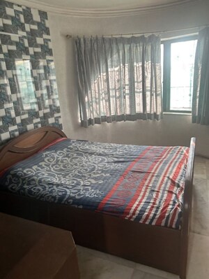 Bedroom in 2 BHK Apartment at Rustomjee Raag, Goregaon East – for Sale