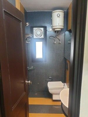 Bathroom in 3 BHK Builder Floor at Kalkaji – for Rent