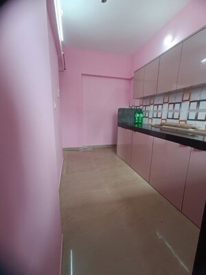 Kitchen in 2 BHK Apartment at Ashutosh CHS Goregaon, Goregaon West – for Rent