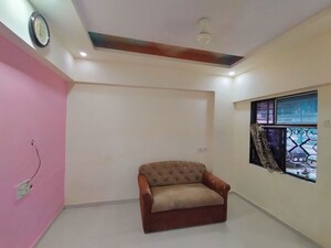 Living Room in 1 BHK Apartment at Gundecha Greens, Kandivali East – for Sale
