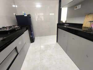 Kitchen in 2 BHK Apartment at Vaibhav Queens Park, Chembur – for Sale