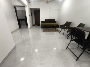 Living Room in 2 BHK Apartment at Vaibhav Queens Park, Chembur – for Sale