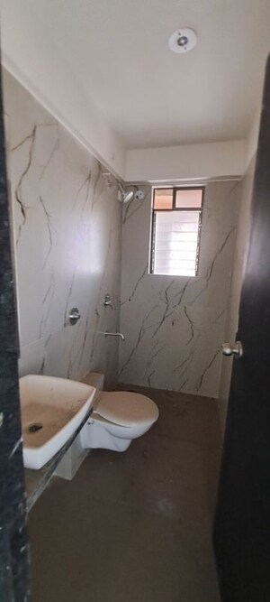 Bathroom in 2.5 BHK Apartment at Tharwani Millennium City, Badlapur East – for Rent