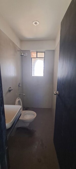 Bathroom in 2.5 BHK Apartment at Tharwani Millennium City, Badlapur East – for Rent