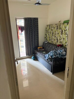 Room in 2.5 BHK Apartment at Sapphire Heights, Kandivali East – for Sale
