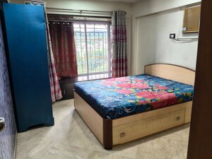 Bedroom in 2 BHK Apartment at Harbour Court, Nerul Sector 19a – for Rent