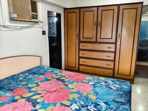 Bedroom in 2 BHK Apartment at Harbour Court, Nerul Sector 19a – for Rent