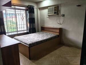 Bedroom in 2 BHK Apartment at Harbour Court, Nerul Sector 19a – for Rent