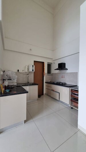 Kitchen in 2 BHK Apartment at Gera Planet Of Joy, Kharadi – for Rent