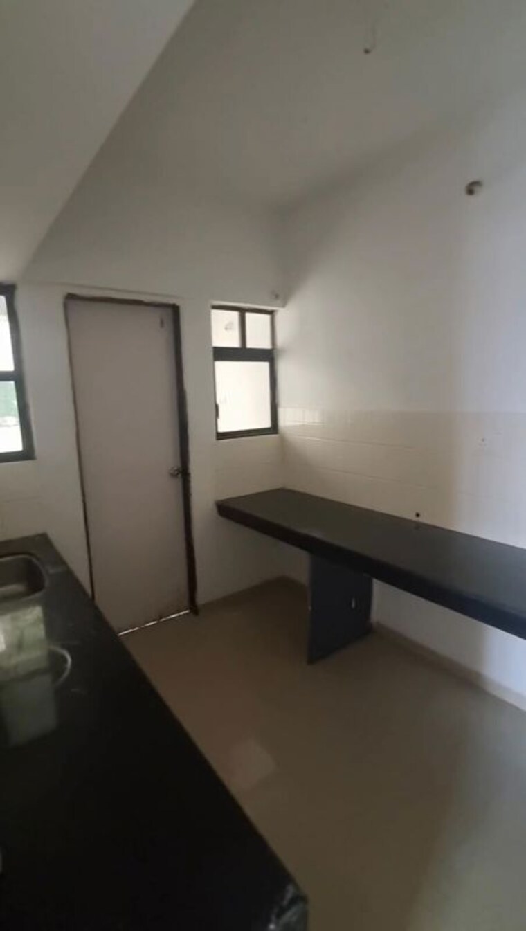 Kitchen, nagpal-dev-exotica 3 Bedroom 1800 Sq.Ft. Apartment In Kharadi Pune 10694001