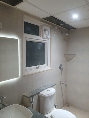 Bathroom in 3 BHK Apartment at Bhartiya City Nikoo Homes 6, Kogilu – for Rent