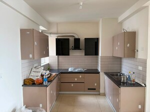 Kitchen in 3 BHK Apartment at Homeland Global Park CP Atelier, Industrial Area – for Rent