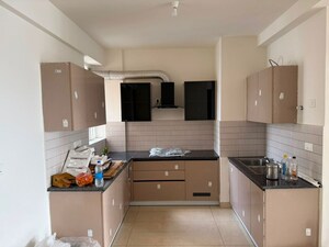 Kitchen in 3 BHK Apartment at Homeland Global Park CP Atelier, Industrial Area – for Rent
