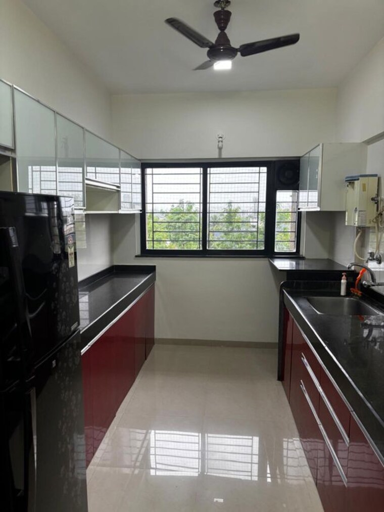 Kitchen, kalpataru-estate 2.5 Bedroom 850 Sq.Ft. Apartment In Pimple Gurav Pune 10694019