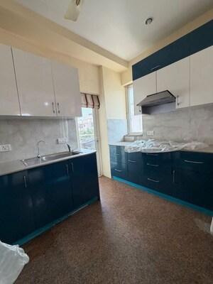Kitchen in 3 BHK Apartment at Raheja Atlantis II, Sector 31 – for Rent