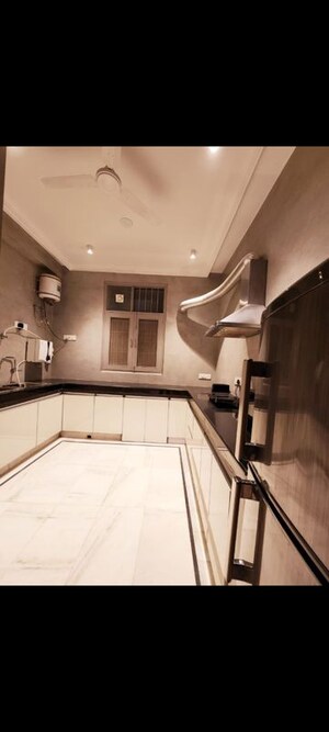 Kitchen in 3 BHK Builder Floor at Kailash Colony – for Sale