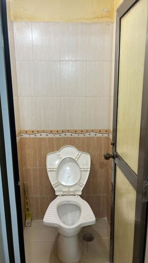 Bathroom in 2 BHK Apartment at Himgiri Lokupvan Phase II CHS Ltd, Vasant Vihar – for Rent