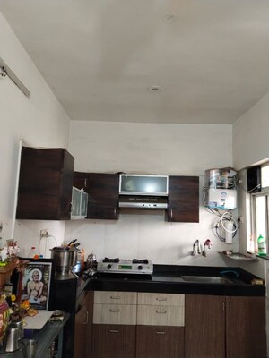 Kitchen in 2 BHK Apartment at Greenland Residency, Hinjewadi – for Rent
