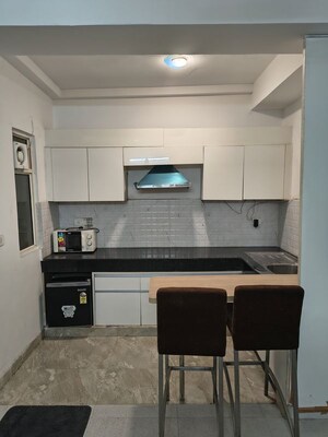 Kitchen in Studio Apartment at Nimbus The Golden Palm, Sector 168 – for Rent