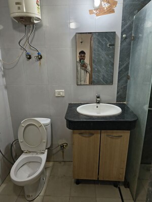 Bathroom in Studio Apartment at Nimbus The Golden Palm, Sector 168 – for Rent