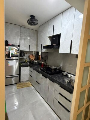 Kitchen in 2 BHK Apartment at Paradigm El Signora, Jogeshwari West – for Sale