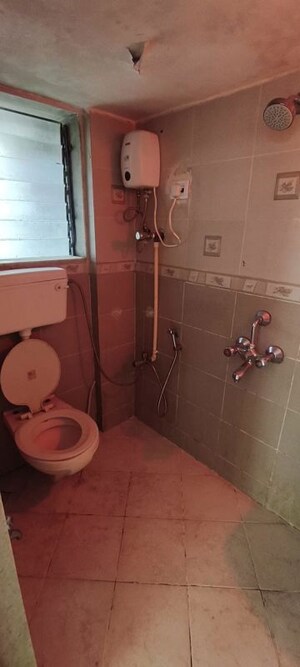 Bathroom in 2 BHK Apartment at Sai Krishna Kunj, Andheri West – for Rent