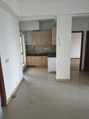 Kitchen in 2.5 BHK Apartment at Nimbus The Golden Palm, Sector 168 – for Rent