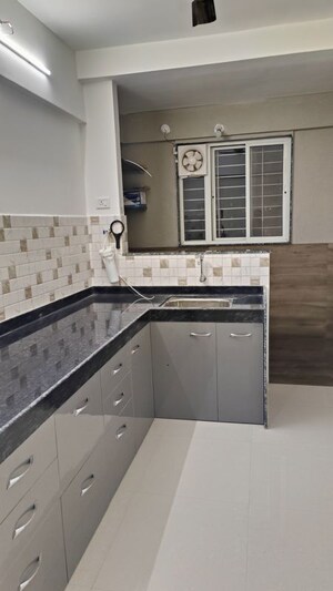 Kitchen in 2.5 BHK Apartment at Adhya Radhakrishna, Moshi – for Rent
