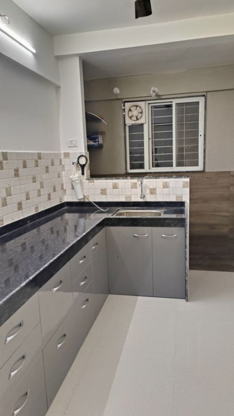 Kitchen, adhya-radhakrishna 2.5 Bedroom 801 Sq.Ft. Apartment In Moshi Pune 10694187